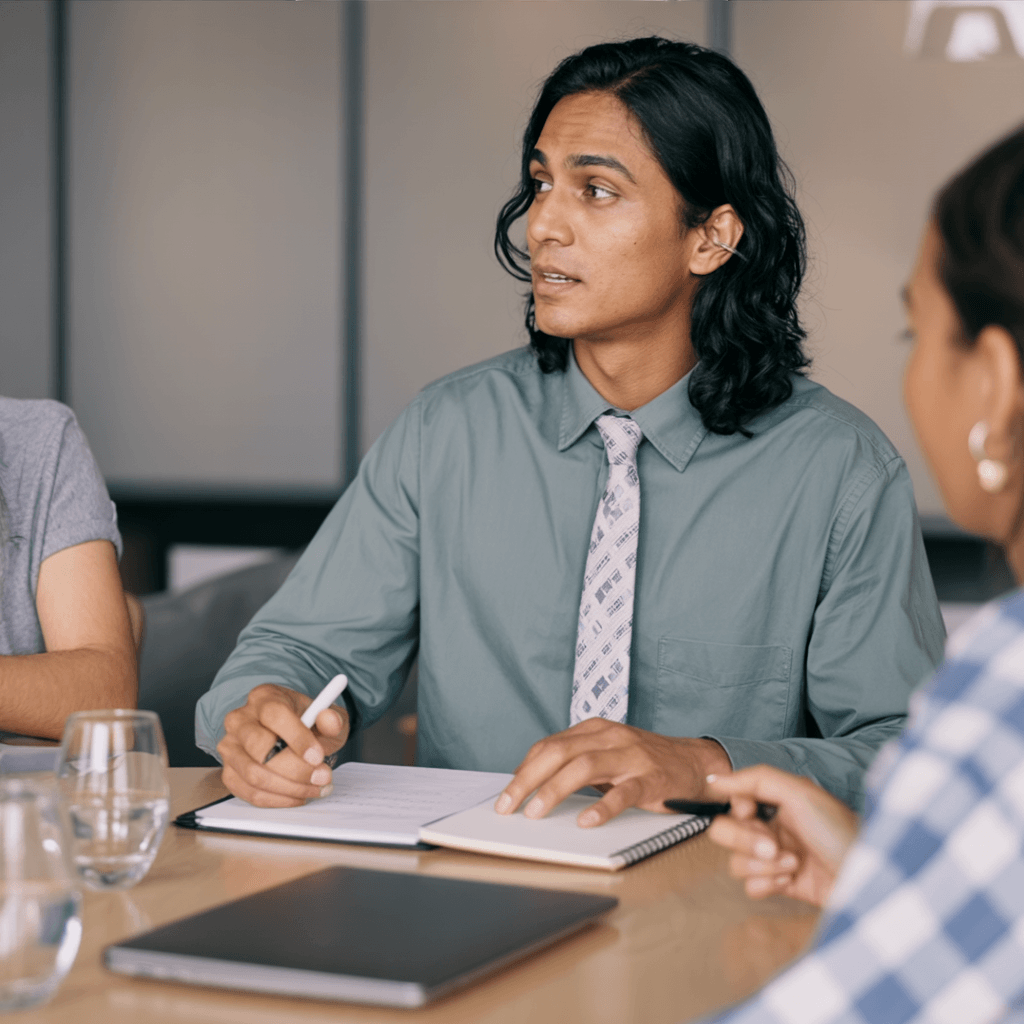 Kiran Mehta meeting with colleagues
